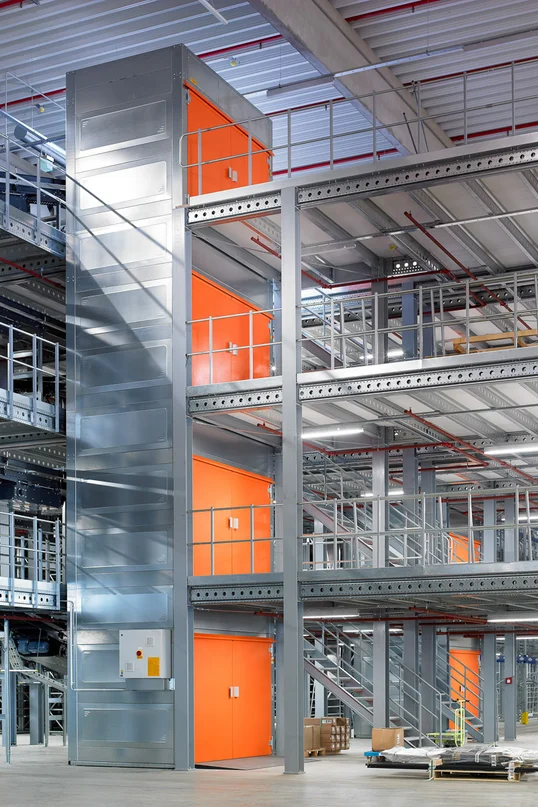 sherpa lift which gives access to multiple floors of a warehouse